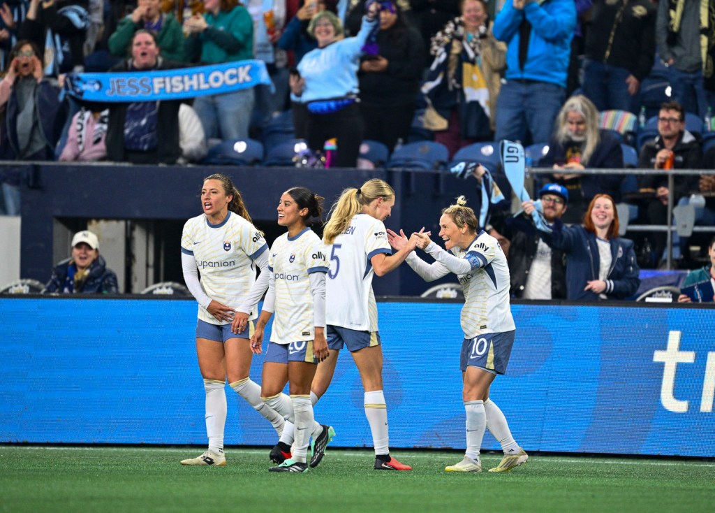 Reign Eliminate Legacy in Stormy Showdown in Seattle